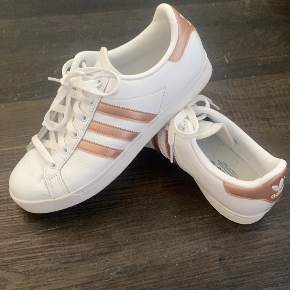 Rose gold Adidas sneakers